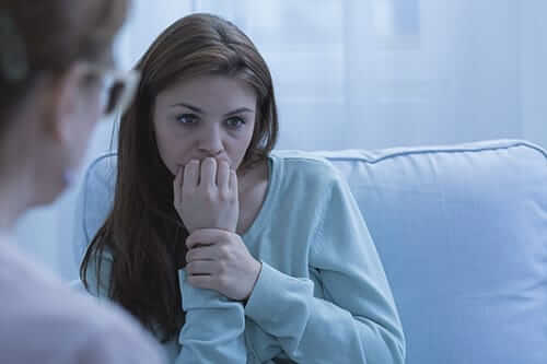 Womens North Carolina Trauma Treatment young woman talking with parent about womens North Carolina trauma treatment